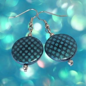 Teal Blue Circle black cross-hatch pierced disc earrings.